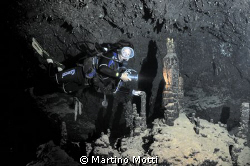 The model was swimming inside the famous "Cathedral Cave"... by Martino Motti 